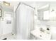 Bathroom featuring a white sink, tile flooring, and a shower with curtain at 6167 Ralston Ave, Indianapolis, IN 46220