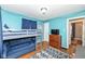 Bedroom has a bunk bed, hardwood floor, blue walls and dresser at 6167 Ralston Ave, Indianapolis, IN 46220