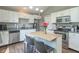 Well-equipped kitchen with stainless steel appliances and an island, great for cooking and entertaining at 623 White Ash Trl, Mooresville, IN 46158