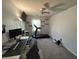 Spacious office with desk, and exercise equipment; ideal for work or workouts at 623 White Ash Trl, Mooresville, IN 46158