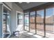 Bright screened-in porch with view of the backyard, offering a peaceful retreat with natural light at 623 White Ash Trl, Mooresville, IN 46158