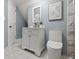 Nicely appointed bathroom featuring a modern vanity, toilet, and stylish tile flooring at 629 N Keystone Ave, Indianapolis, IN 46201