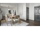 Dining room showcases a wooden table set, complemented by modern accents and a cozy rug at 629 N Keystone Ave, Indianapolis, IN 46201