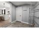 Entryway area featuring tile flooring, leading to a modern kitchen and dining area at 629 N Keystone Ave, Indianapolis, IN 46201