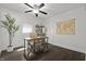 Bright office space with a wooden desk, a comfortable chair, and a decorative world map at 629 N Keystone Ave, Indianapolis, IN 46201