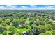 Aerial shot showcases neighborhood surrounded by lush green trees at 6440 Saint Joe Dr, Indianapolis, IN 46217