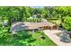 Aerial view of the home showcasing landscaping and a two-car garage at 6440 Saint Joe Dr, Indianapolis, IN 46217