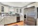 Well-lit kitchen featuring stainless steel appliances, tiled backsplash, and ample counter space at 6440 Saint Joe Dr, Indianapolis, IN 46217