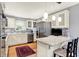 Bright kitchen with stainless steel appliances, granite countertops, and ample cabinet space at 6440 Saint Joe Dr, Indianapolis, IN 46217
