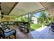 Cozy covered patio offering outdoor seating and backyard views at 6440 Saint Joe Dr, Indianapolis, IN 46217