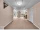Large basement with carpet, drop ceiling, and bar area at 65 Palomino Ct, Zionsville, IN 46077