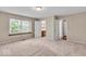 Spacious bedroom with neutral carpet and lots of natural light at 65 Palomino Ct, Zionsville, IN 46077