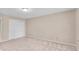 Bedroom featuring neutral carpet, paint, and a closet at 65 Palomino Ct, Zionsville, IN 46077