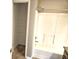 Bright bathroom with a shower and a built-in shelf at 6634 Frankenberger Dr, Indianapolis, IN 46237