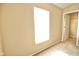 Bright bedroom featuring a window and a doorway to a closet space at 6634 Frankenberger Dr, Indianapolis, IN 46237