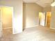 Primary bedroom featuring carpet and vaulted ceiling at 6634 Frankenberger Dr, Indianapolis, IN 46237