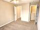 This bedroom features neutral walls, carpet floors, and a ceiling fan for added comfort at 6634 Frankenberger Dr, Indianapolis, IN 46237