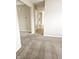 Open-concept living room showcasing a neutral color palette, carpeted floors, and seamless transition to the kitchen at 6634 Frankenberger Dr, Indianapolis, IN 46237