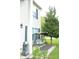Cozy porch swing with a canopy, nestled next to a well-maintained lawn and mature landscaping at 6634 Frankenberger Dr, Indianapolis, IN 46237