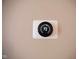 Image of a digital thermostat mounted on a light-colored wall, displaying a set temperature of 72 at 6634 Frankenberger Dr, Indianapolis, IN 46237