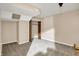 Carpeted room featuring an open closet with a hanging rod and recessed ceiling lights at 676 La Placita St, Greenwood, IN 46143