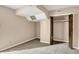 Carpeted room featuring an open closet with a hanging rod and recessed ceiling lights at 676 La Placita St, Greenwood, IN 46143