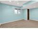 Bright bedroom with a window for natural light, and comfortable carpet flooring at 676 La Placita St, Greenwood, IN 46143