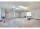 Spacious three car garage with multiple lights and outlets at 676 La Placita St, Greenwood, IN 46143