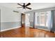 Bright, open living room with hardwood floors, neutral paint, and a view of the staircase at 676 La Placita St, Greenwood, IN 46143