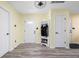 Inviting foyer with coat rack and shoe storage, seamlessly blending style and functionality with attractive vinyl flooring at 6842 Viola Ct, Indianapolis, IN 46237