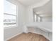 Office area features built in desk space and a window view to the front yard at 6871 Seabiscuit Rd, Whitestown, IN 46075