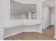 The built in office space overlooks the rest of the kitchen and living areas at 6871 Seabiscuit Rd, Whitestown, IN 46075