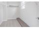 Walk-in closet with shelving and a window, offering ample storage space at 6871 Seabiscuit Rd, Whitestown, IN 46075