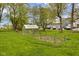 Spacious backyard with a small greenhouse and garden, perfect for outdoor living at 70 Casco Dr, Avon, IN 46123