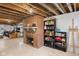 Finished basement features a brick fireplace, an exposed ceiling and a large open space at 70 Casco Dr, Avon, IN 46123