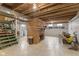 Unfinished basement with exposed ceiling and a brick fireplace at 70 Casco Dr, Avon, IN 46123