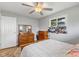 Cozy bedroom featuring wood furniture, light grey walls, and a ceiling fan at 70 Casco Dr, Avon, IN 46123