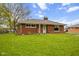 Charming single-story brick home featuring a well-maintained lawn at 70 Casco Dr, Avon, IN 46123