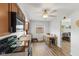 Kitchen features wood cabinets, plank floors and a view into the living room at 70 Casco Dr, Avon, IN 46123