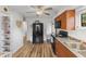 Bright kitchen featuring wood-look floors, wooden cabinets, and modern appliances at 70 Casco Dr, Avon, IN 46123