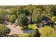 Aerial view showcases a beautiful neighborhood with mature trees and well-maintained lawns at 7126 Nile Ridge Ct, Indianapolis, IN 46236