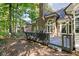 Exterior with patio, tall chimney, brick facade and lots of trees at 7126 Nile Ridge Ct, Indianapolis, IN 46236