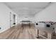 Finished basement area with games, white trim and new flooring at 7126 Nile Ridge Ct, Indianapolis, IN 46236