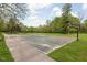 Outdoor basketball court features vibrant green and red markings with hoops at both ends at 7126 Nile Ridge Ct, Indianapolis, IN 46236
