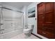 Bright bathroom featuring a toilet, tiled floor, large mirror and walk-in shower at 7126 Nile Ridge Ct, Indianapolis, IN 46236