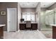 Light and airy bathroom vanity area, complete with desk, natural light, and glass walk-in shower at 7126 Nile Ridge Ct, Indianapolis, IN 46236