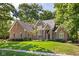 Beautiful brick home featuring a well-maintained lawn and lush landscaping for great curb appeal at 7126 Nile Ridge Ct, Indianapolis, IN 46236