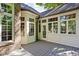 Exterior patio with lots of windows and an entrance door at 7126 Nile Ridge Ct, Indianapolis, IN 46236