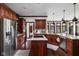 Well-equipped kitchen with stainless steel appliances, granite countertops and custom cabinetry at 7126 Nile Ridge Ct, Indianapolis, IN 46236