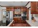 Modern kitchen features granite countertops, stainless steel appliances, and custom cabinets at 7126 Nile Ridge Ct, Indianapolis, IN 46236
